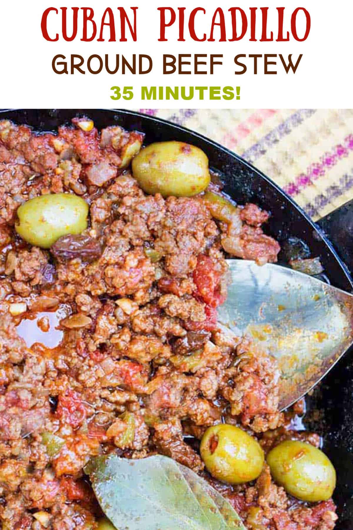 Pinterest pin: black skillet filled with ground beef stew with olives